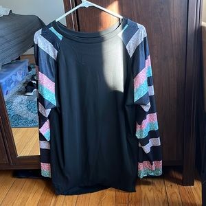 Black shirt, multi colored sleeve